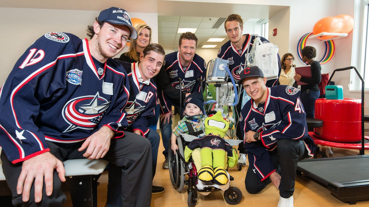Blue Jackets score smiles visiting local hospital